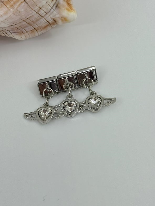 Nomi  Charm