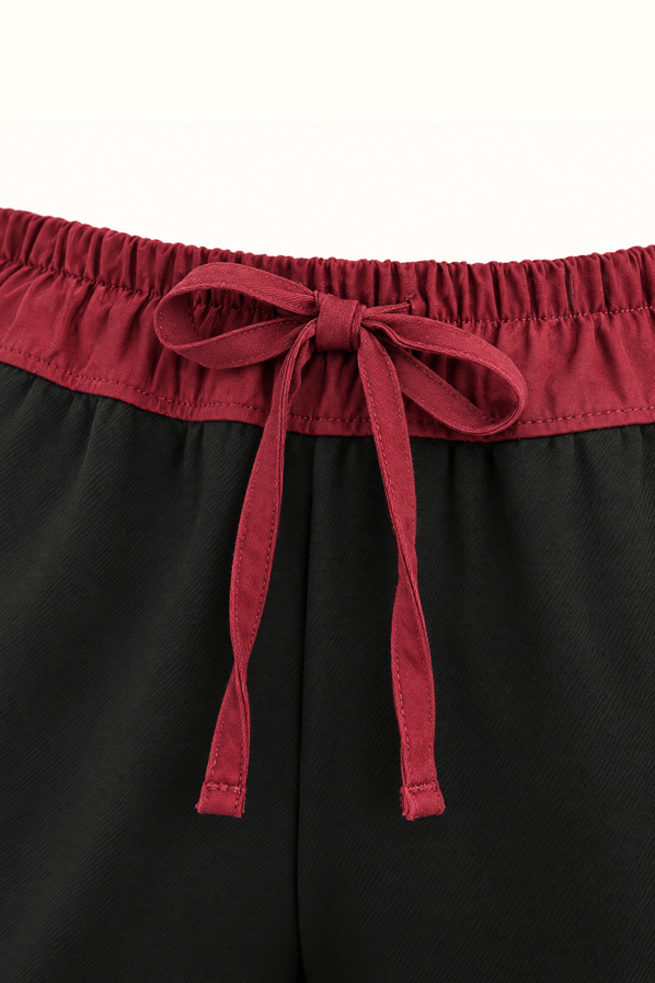 Bordo Renk Bloklu Siyah PantolonSezgi Tekin