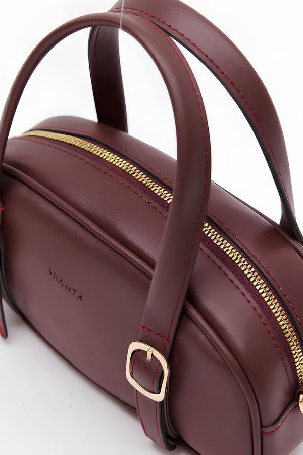 Bordo D61 Gold Tokalı Oval Tasarımlı Fermuarlı Geniş İç Hacimli Şık ve Zarif Kadın El ve Omuz Çantası