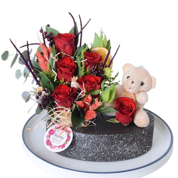 Red Roses in a Boat-Patterned Pot