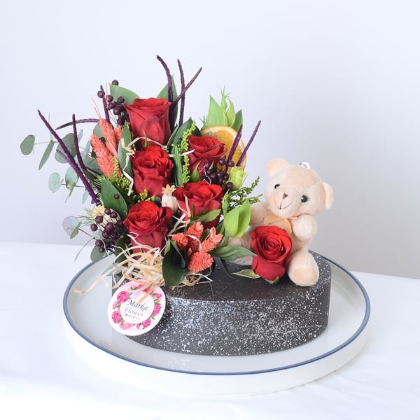 Red Roses in a Boat-Patterned Pot