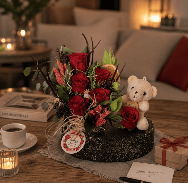 Red Roses in a Boat-Patterned Pot