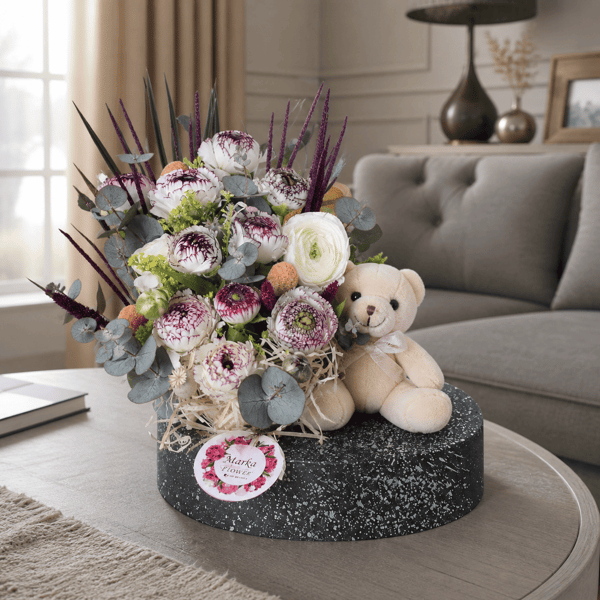 White Eren Roses in a boat-patterned pot