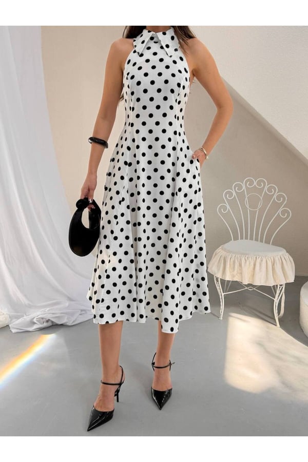 Premium Puantiyeli Halter Yaka Midi Elbise – Zarif ve Fonksiyonel Tasarım