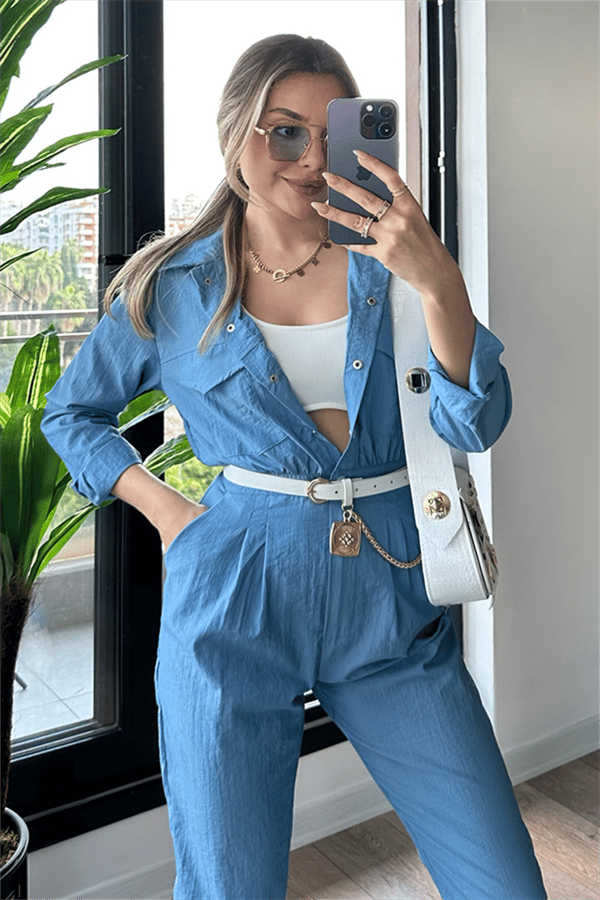Mita önü zımbalı mavi spor tulum
