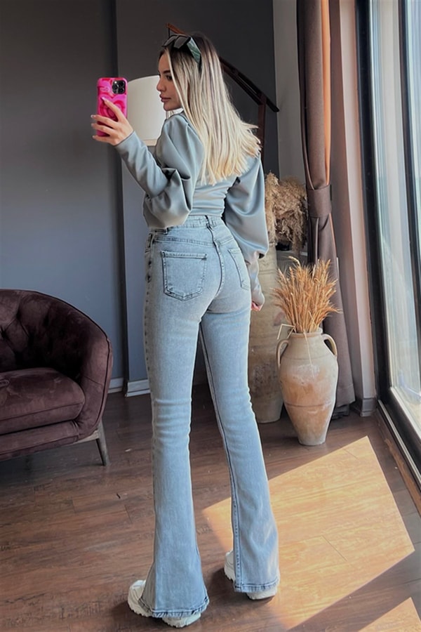 Paçası yırtmaç detaylı füme jean