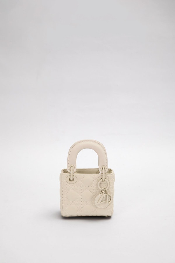 LevidorKrem Mini Boy Aksesuar Detaylı El Çantası