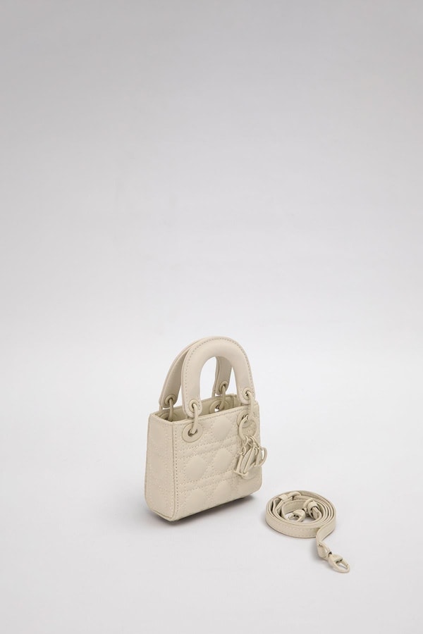 LevidorKrem Mini Boy Aksesuar Detaylı El Çantası