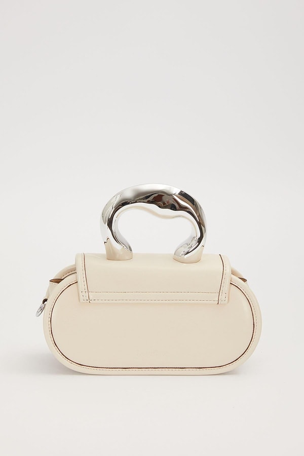 LevidorKrem Oval Görünümlü Metal Aksesuarlı El Çantası