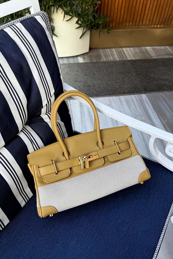LevidorSarı Oval Kilit Detay El Çantası