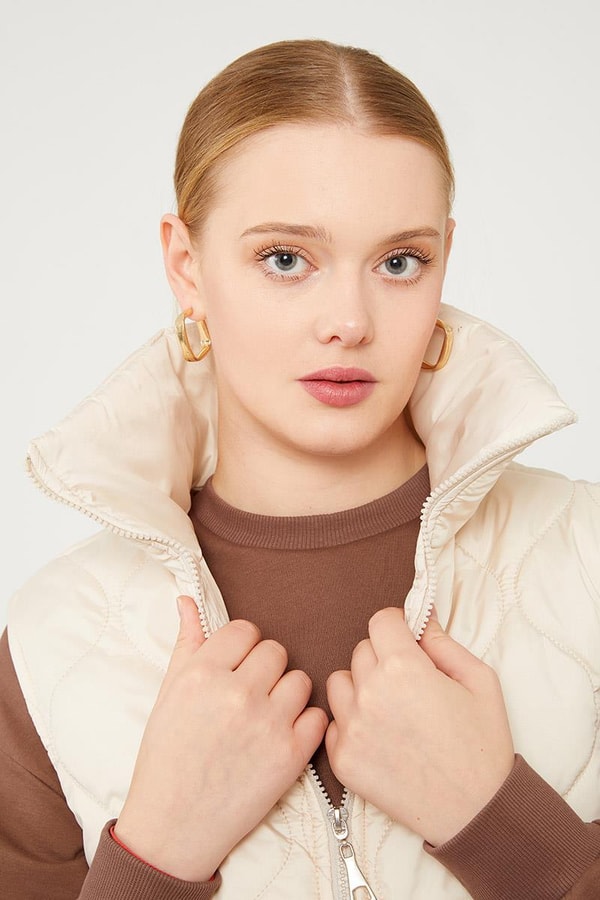 LevidorLevidor Bej Desenli Kapitone Şişme Yelek