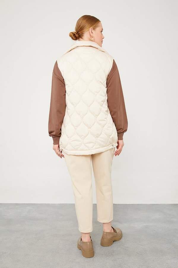 LevidorLevidor Bej Desenli Kapitone Şişme Yelek