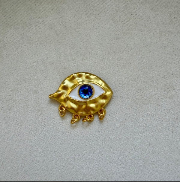 Mat Gold , Göz Broş