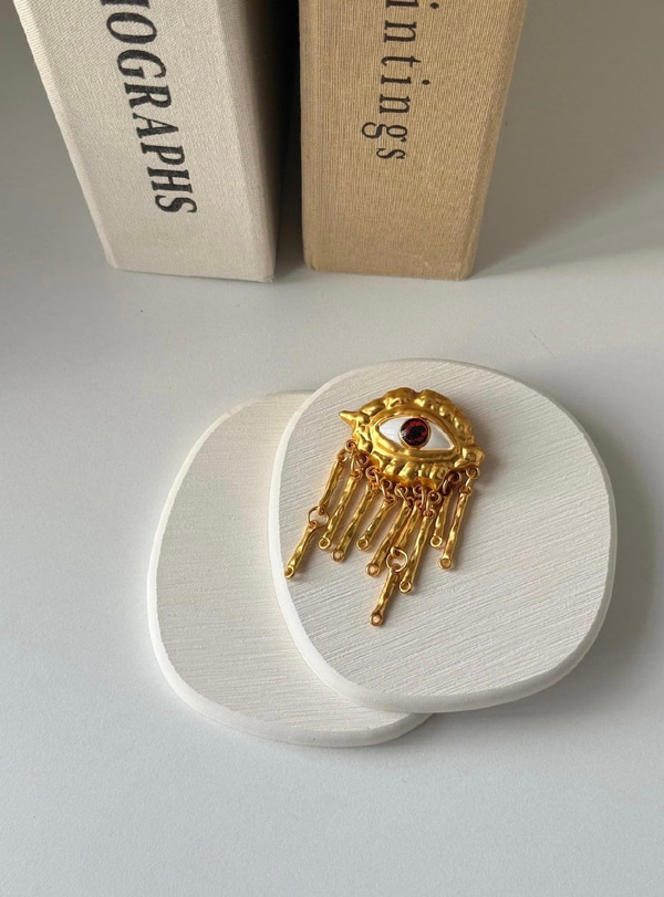 Mat Gold , Sarkıtlı Göz Broş