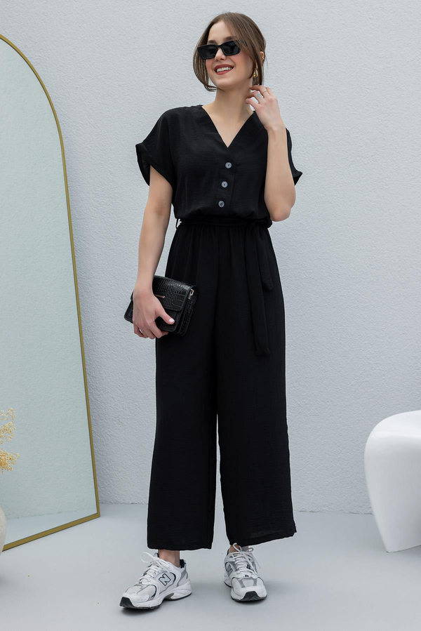 Schwarz Jumpsuits