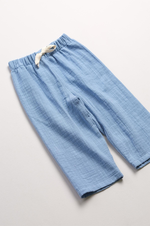 Bonderro Flamlı Müslin Bol Kesim Unisex Çocuk Pantolonu %100 PamukBonderro Flamlı Müslin Bol Kesim Unisex Çocuk Pantolonu %100 Pamuk