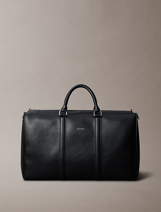Calvin Klein Calvin Klein Erkek Deri Geniş Kısa Kulp Ve Uzun Omuz Askı Metal Logo Siyah Valiz LV04D3158G-UB1