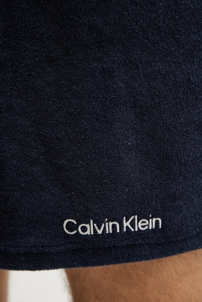 Calvin Klein Erkek Logo Detaylı Hızlı Kuruyan Kumaşlı Lacivert Deniz Şortu LV00NM2989-0PP