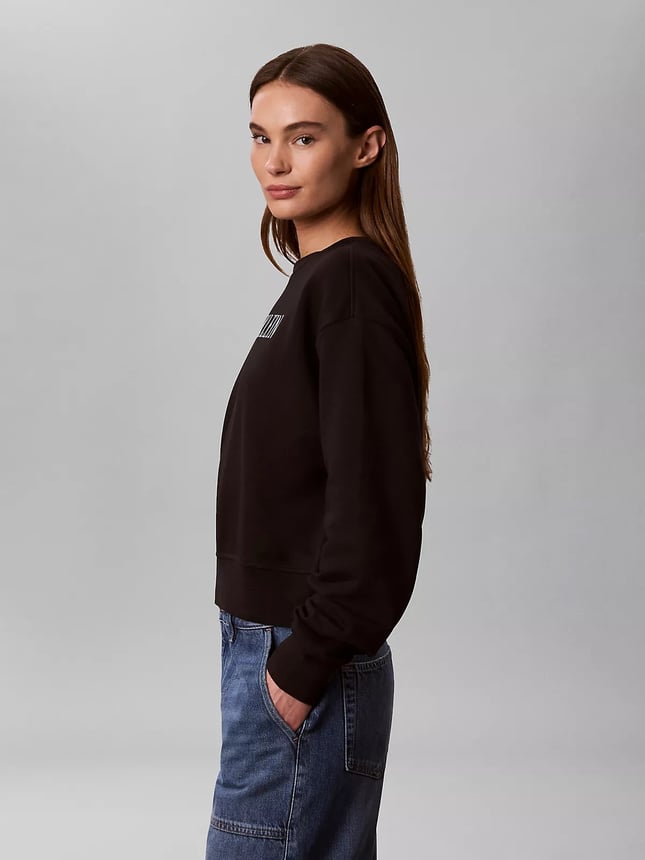 Calvin Klein Kadın Rahat Kalıp Yuvarlak Yakalı Logo Baskılı Düşük Omuzlu Pamuklu Uzun Kollu Siyah Sweatshirt LV047H806G-UB1