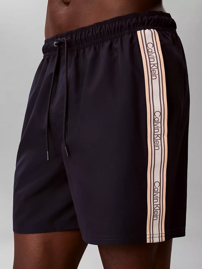 Calvin Klein Calvin Klein Erkek Normal Kesim Elastik Bel Bantlı Yanları Logo İmzalı Şerit Çizgili Mavi Bikini Altı LV00N61042-0PP
