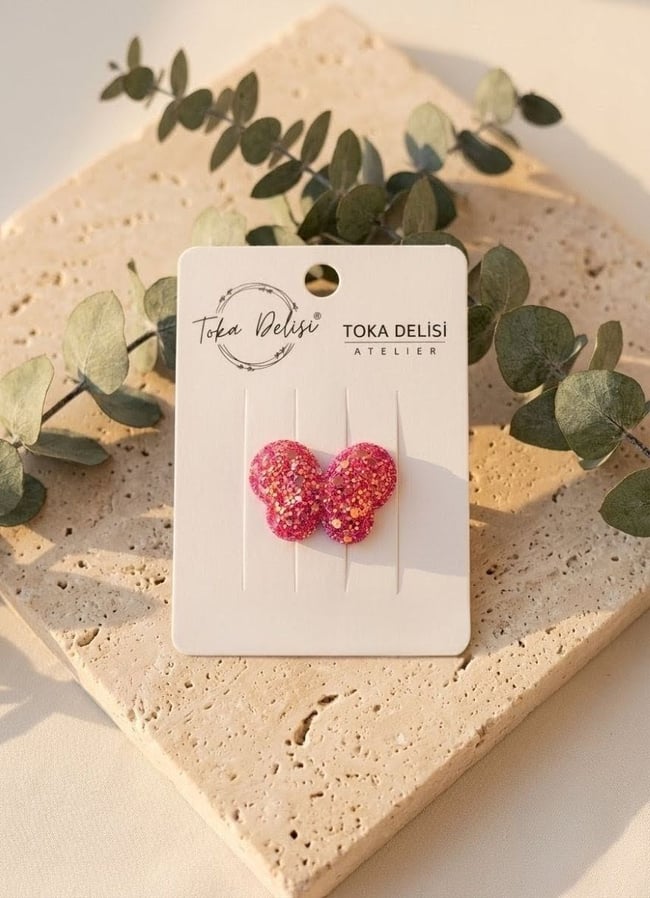 Toka DelisiTOKABebekler İçin Somon Pembe Glitter Taç Figürlü  Saçsız Bebek TokasıBebekler İçin Koyu Pembe Glitter Işıltılı Kelebek Figürlü  Saçsız Bebek Tokası