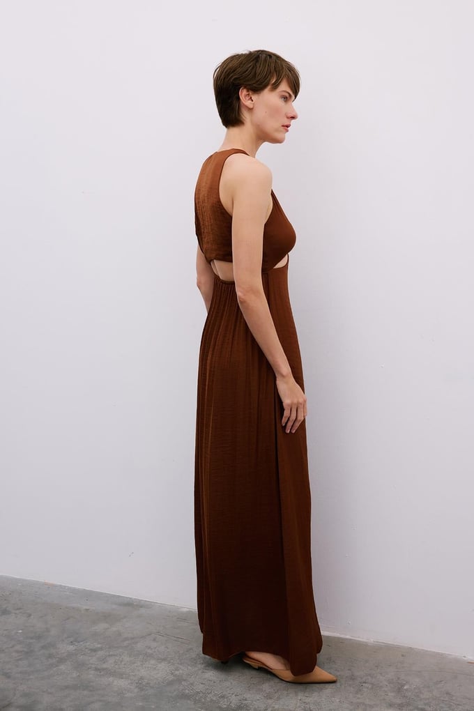 Long Brown Cut-Out Dress with Gold Accessories