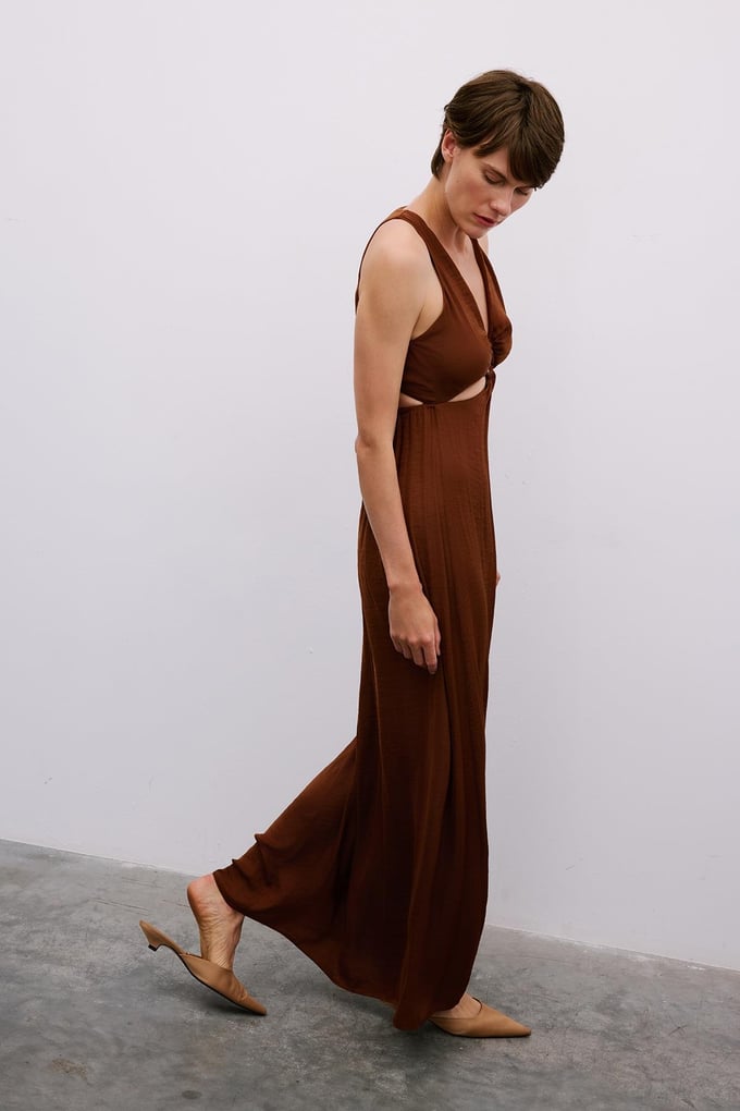 Long Brown Cut-Out Dress with Gold Accessories