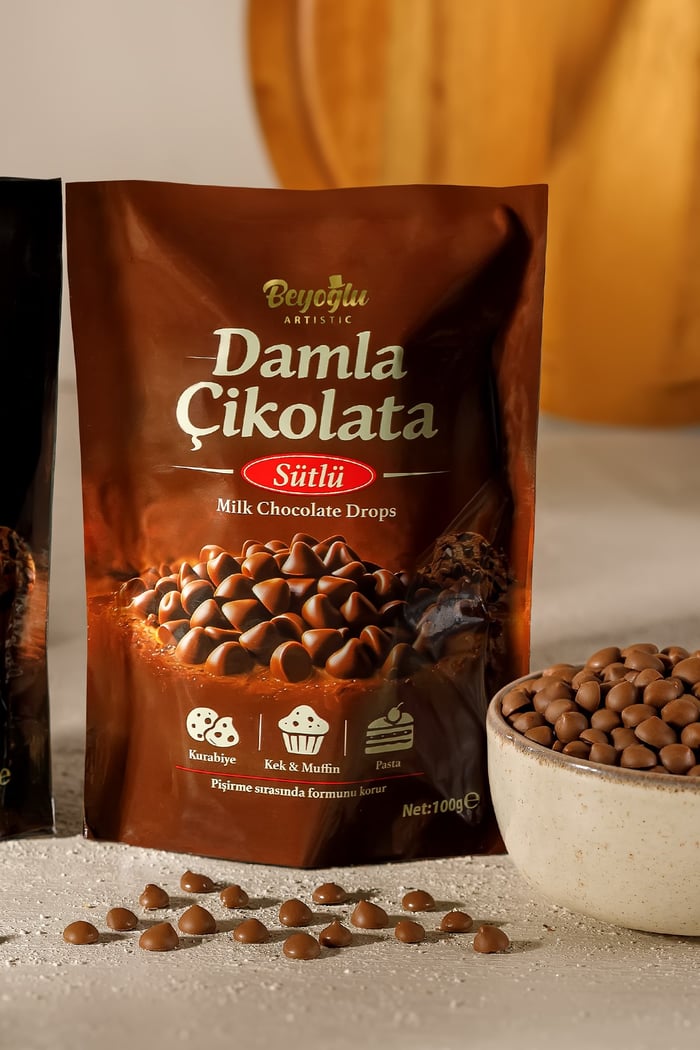 Beyoğlu Çikolata - Sütlü Damla ÇikolataBeyoğlu Sütlü Damla Çikolata 100 gr (Kurabiye,Pasta ve Kek İçin)