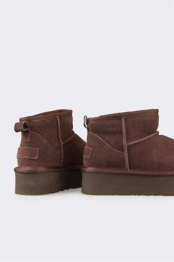 Kahve Deri Kadın Günlük Bot