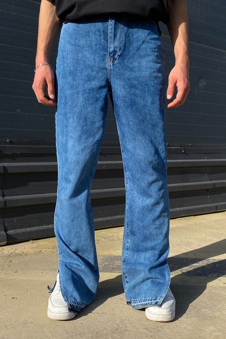 Kesik Paça Detaylı Mavi Baggy Jean