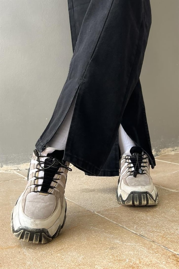 Yırtmaç Detay Siyah Baggy Jean