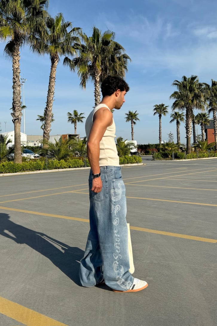 Yan Eskitme Detay Baggy Jean