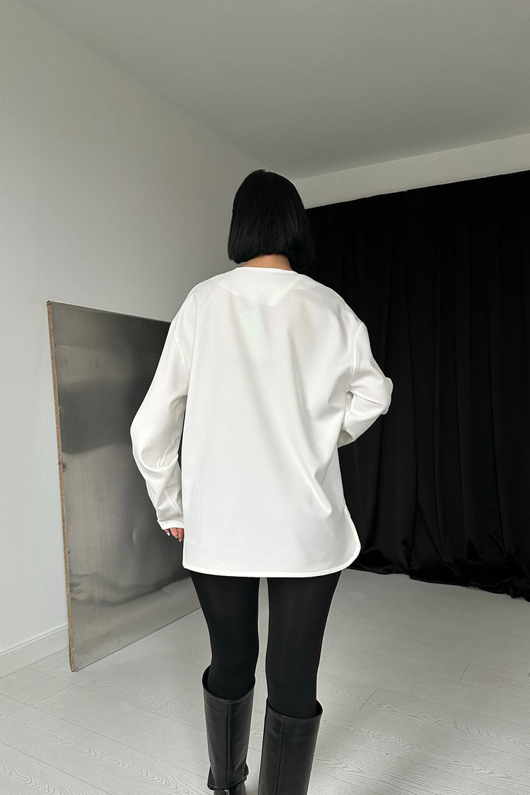 White Blouse With Brooch On The Collar