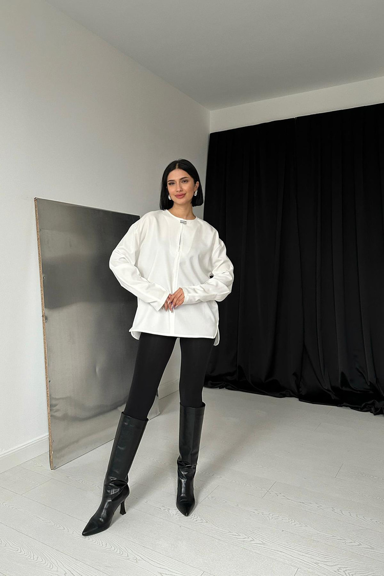 White Blouse With Brooch On The Collar