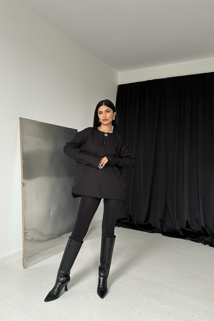 Black Blouse With Brooch On The Collar