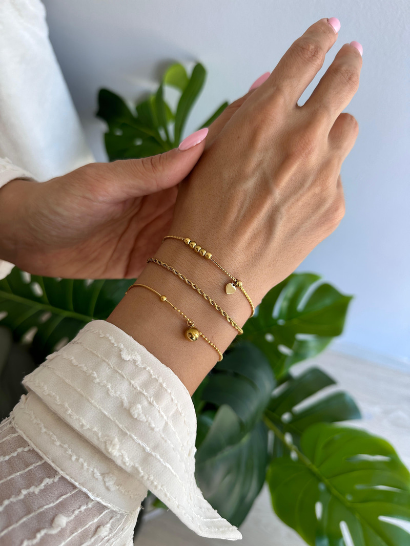 Çelik Kalp Sallantılı Topçuk Bileklik Gold