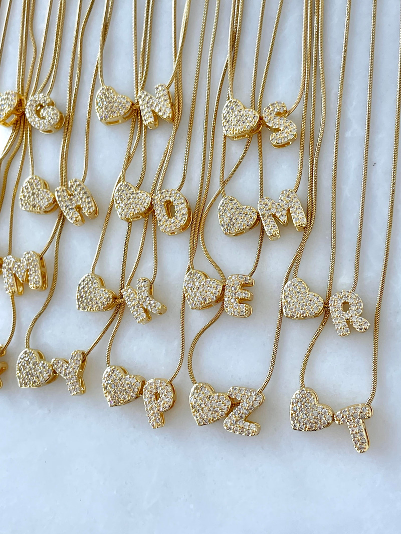 Çelik Gömme Taşlı Kalpli Harf Kolye Gold