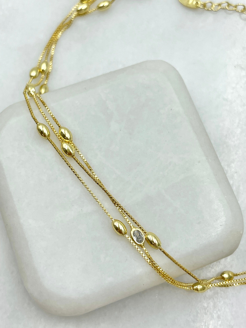 Üç Sıra Oval Topçuk Halhal Gold