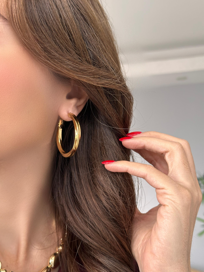 Çelik Kıvrımlı Halka Küpe Gold
