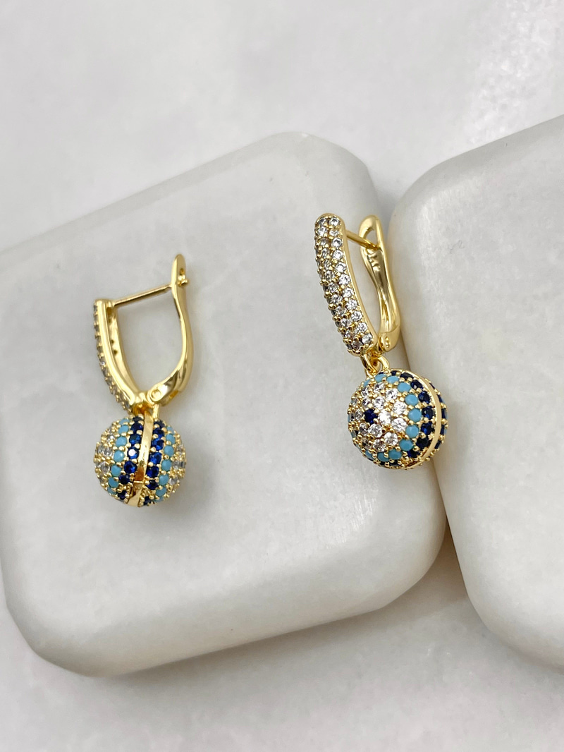 Özel Seri Gömme Taşlı Nazar Sallantlı U Küpe Gold