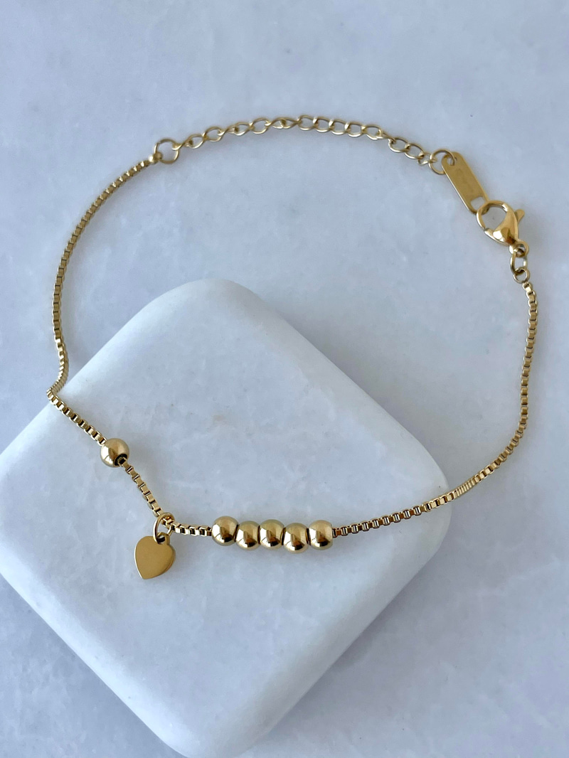 Çelik Kalp Sallantılı Topçuk Bileklik Gold