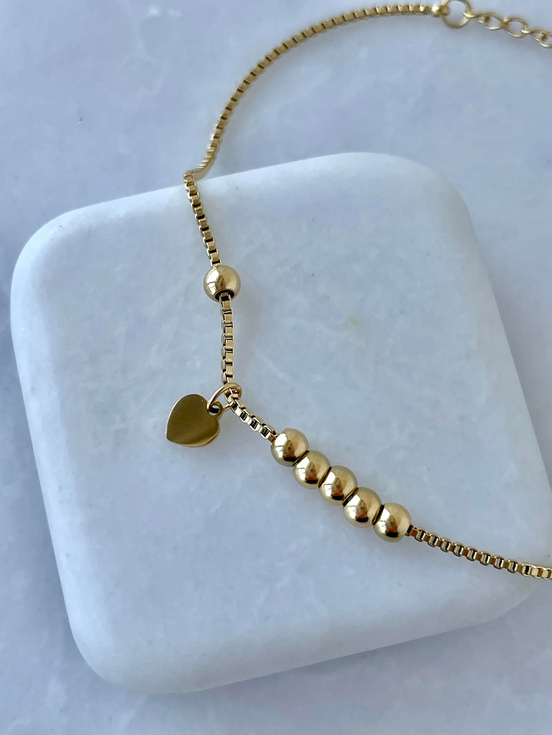 Çelik Kalp Sallantılı Topçuk Bileklik Gold