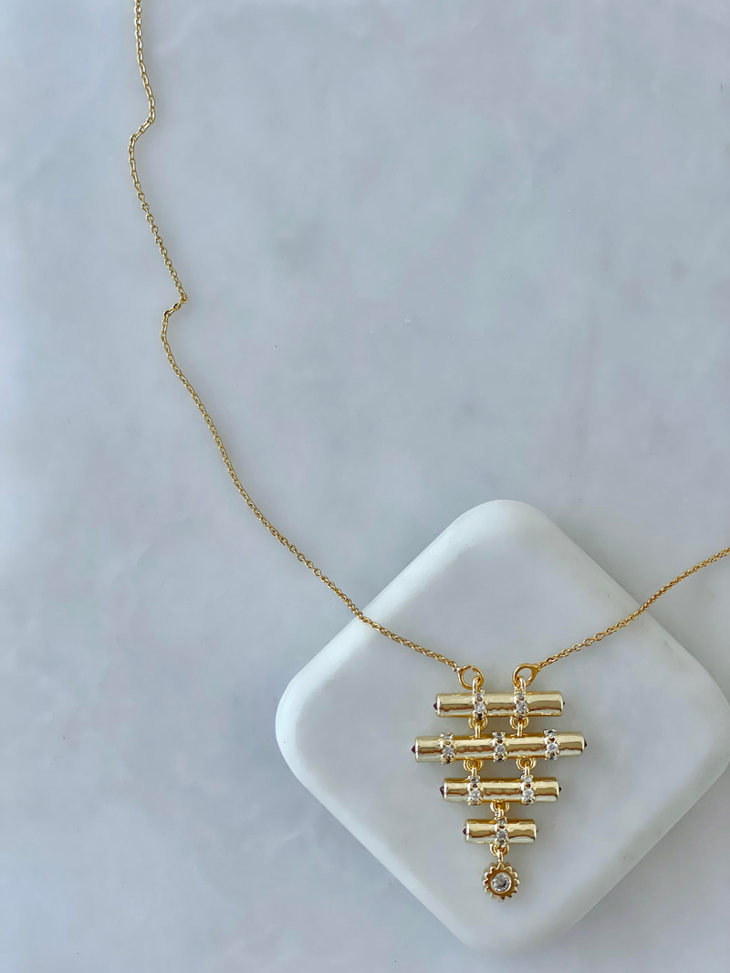 Çelik Uzun Kısa Çubuk Sallantılı Kolye Gold