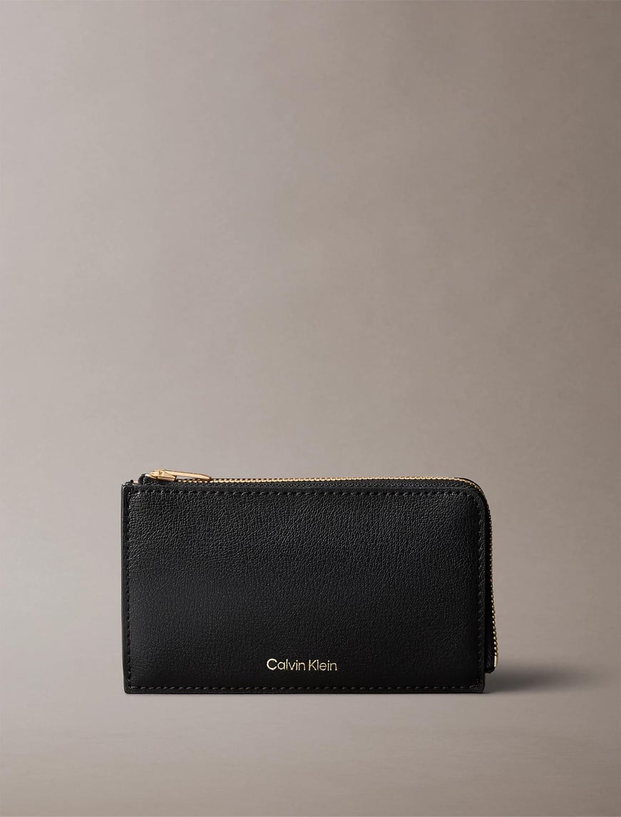 Calvin Klein Calvin Klein Kadın Fermuarlı Bozuk Para Cepli Esktra Kart Bölmeli Logo Detaylı Siyah Cüzdan LV04F1090G-332