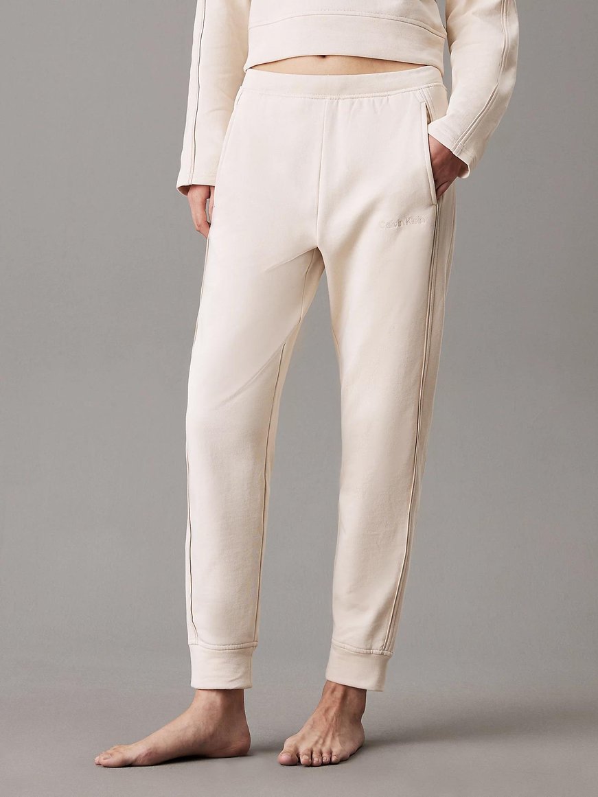 Calvin Klein Calvin Kleın Kadın Lastikli Paça Regular Fit Normal Paça Bej Eşofman Altı 000QS7262E-JB1