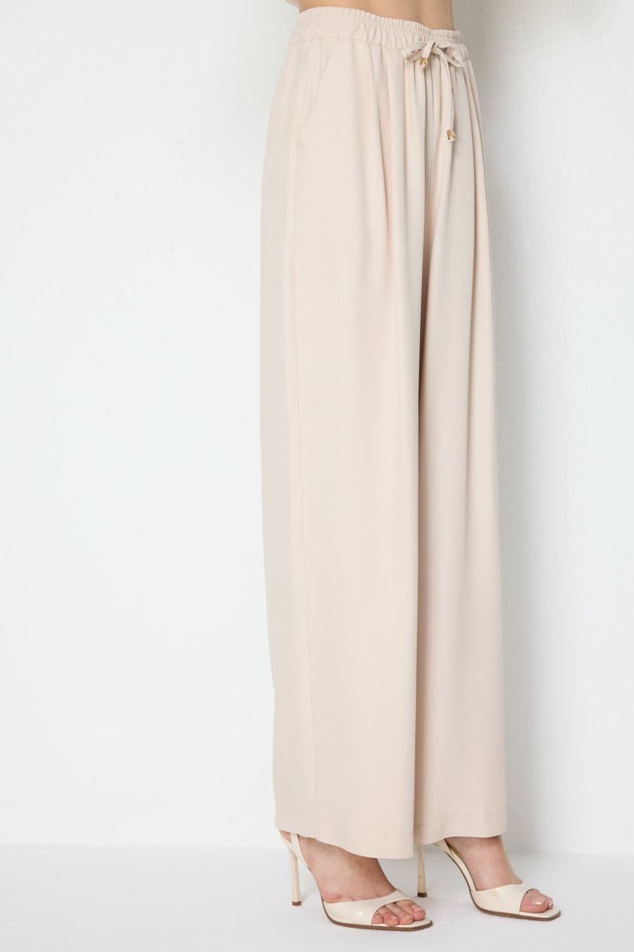 On Beli Lastikli Bol Paça Pantolon Taş