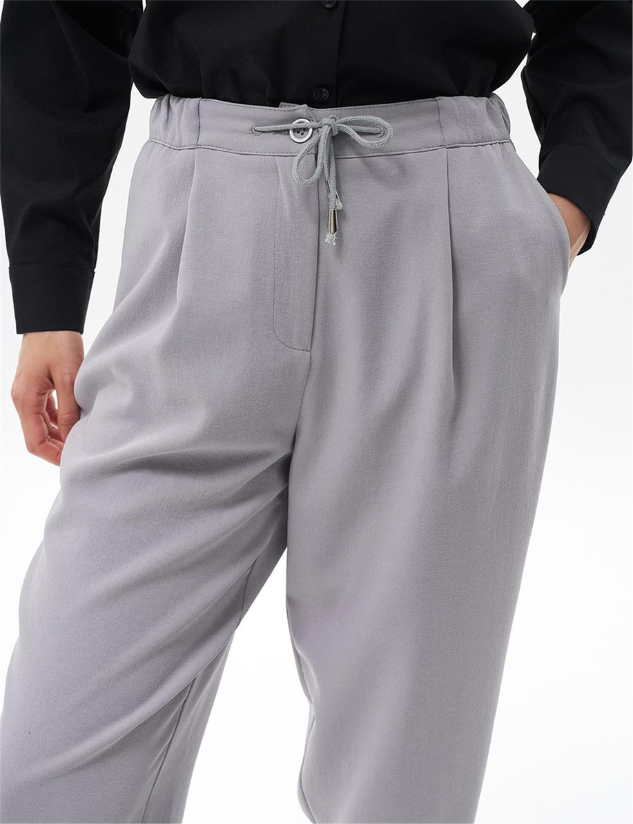 Beli Lastikli Havuç Gri Pantolon