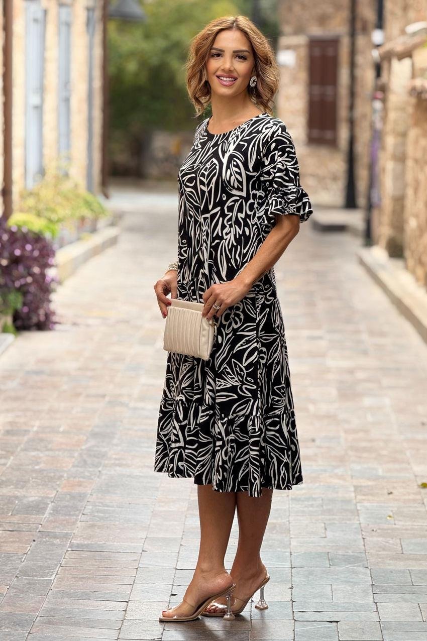 Siyah Yaprak Desenli Etekleri Fırfırlı Yazlık Pamuklu Penye Elbise
