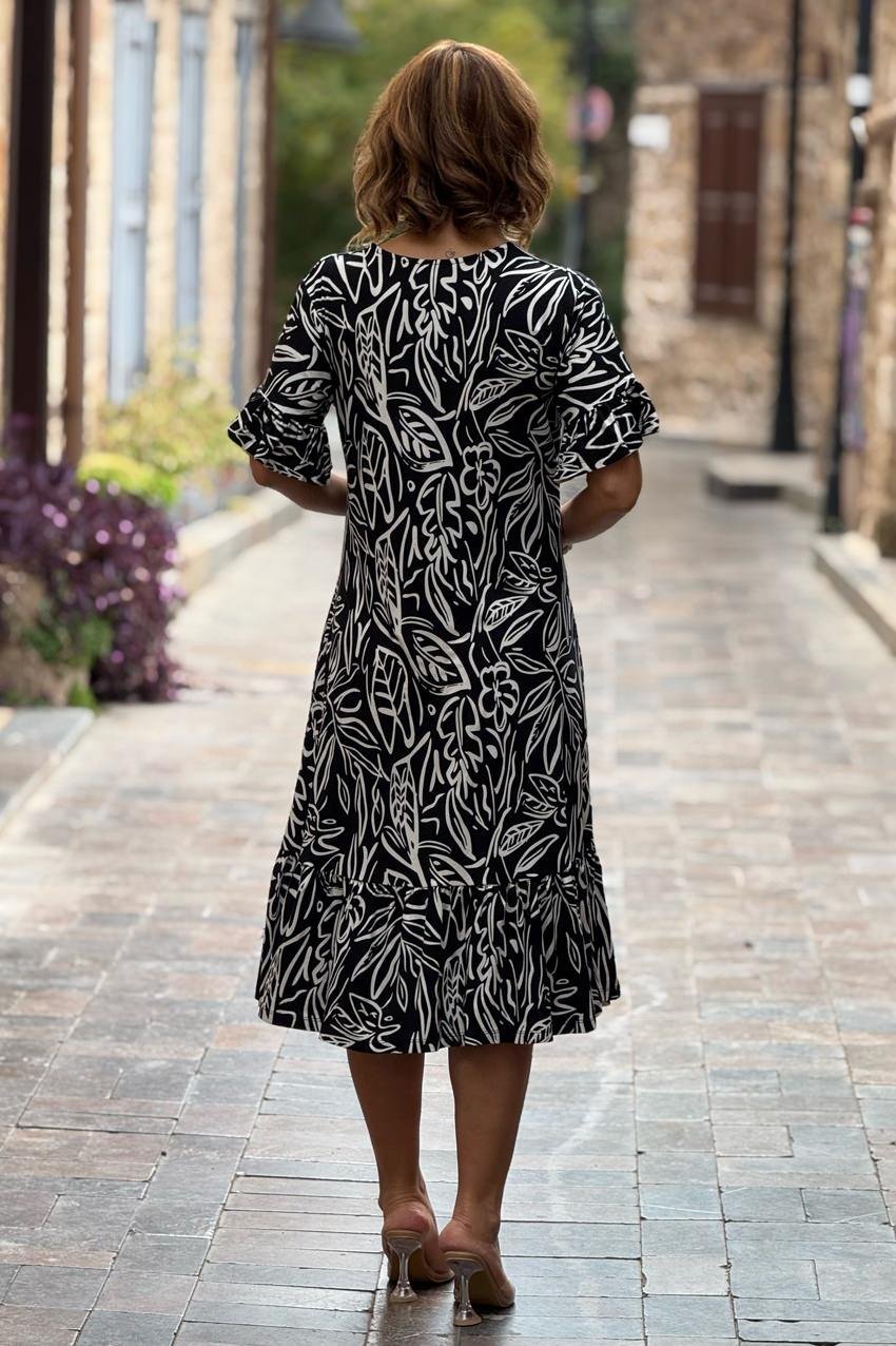 Siyah Yaprak Desenli Etekleri Fırfırlı Yazlık Pamuklu Penye Elbise