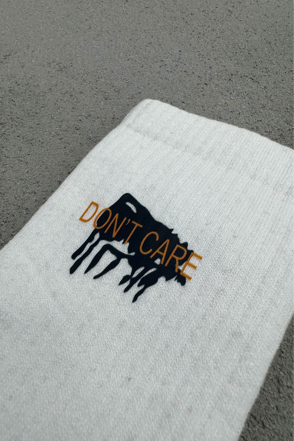Nomarc Dont Care Yazılı Beyaz Çorap
